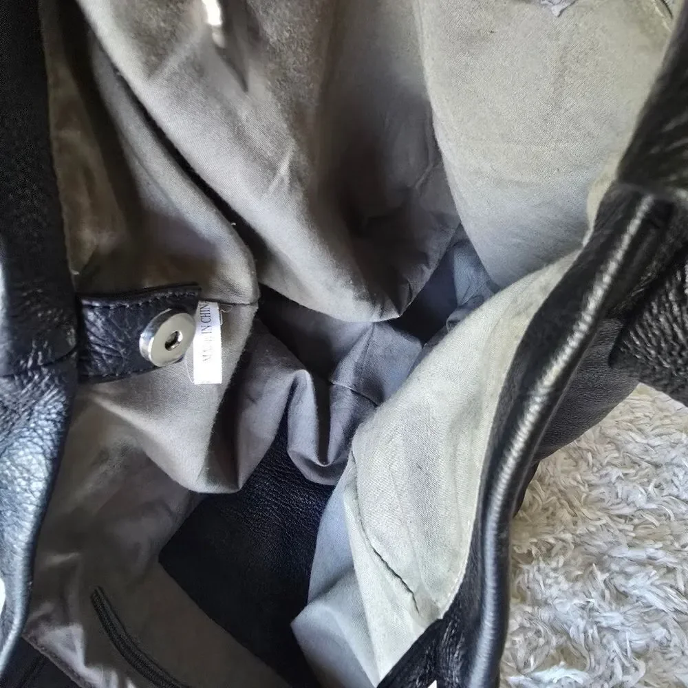 Neta Sade black leather‎ hobo purse.